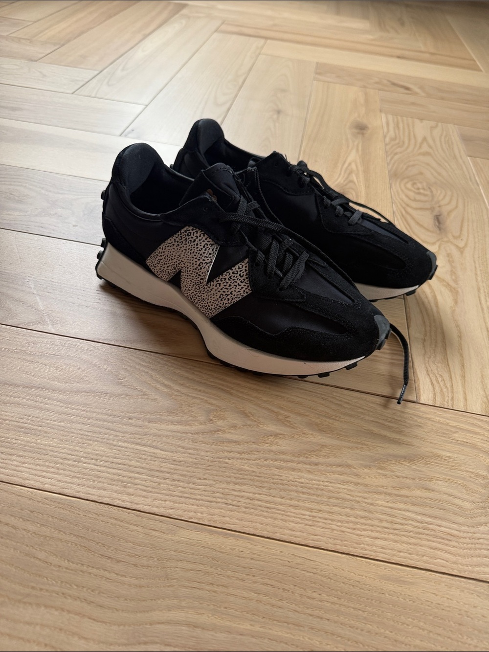 New Balance Women's Black Sneakers with Speckled Accent